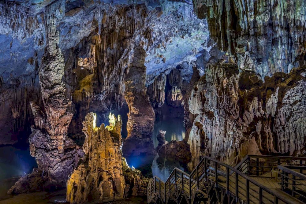 Inside the cave, thousands of uniquely shaped stalactites and stalagmites create a magical world that leaves visitors in awe